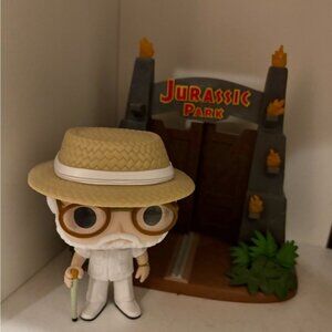 Funko Pop Figure John Hammond and Jurassic Park Gate